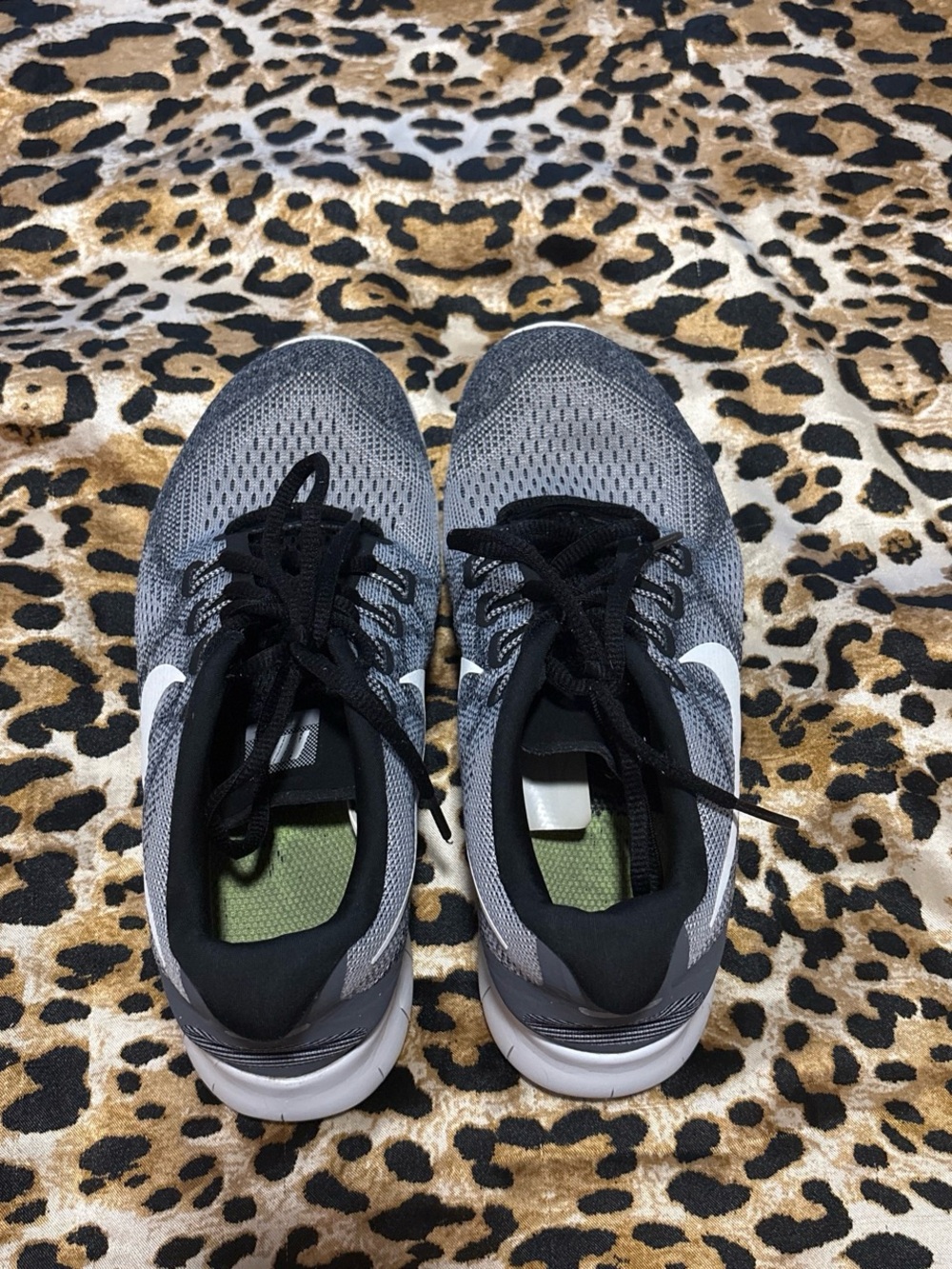 Nike Women's Black and Grey Knit Running Sneakers